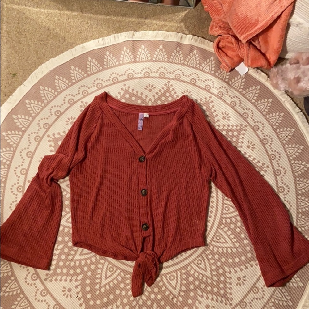 Button up tie bottom bell sleeve top.